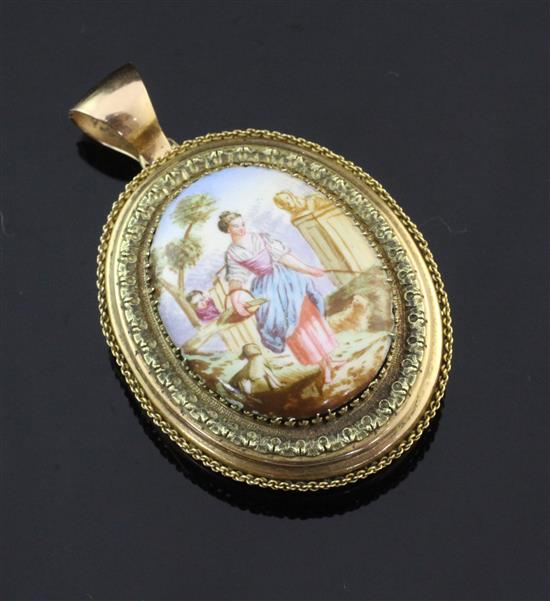 A Victorian style gold and enamel oval locket, 1.75in exc. bale.